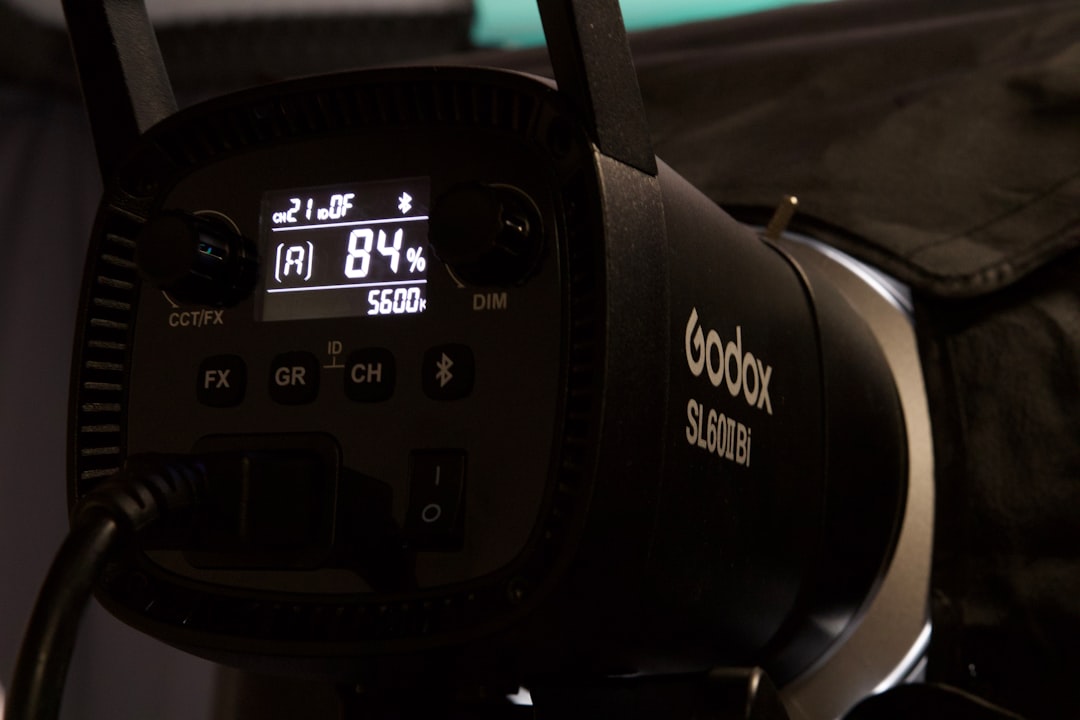 A godox light shows its power level.